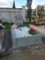 Rivestimento Tomba con Masselli di granito Rosa Beta fiammato e ciottoli di marmo Bianco Carrara